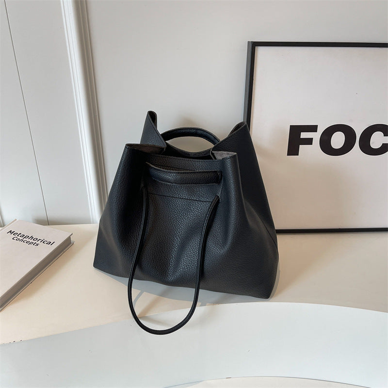 Grote capaciteit damestas, draagbare schoudertas