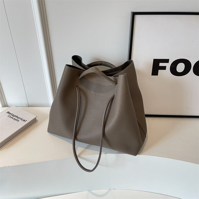 Grote capaciteit damestas, draagbare schoudertas