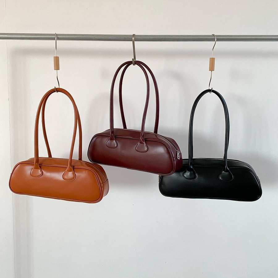 Aurore Oval Baguette Bag