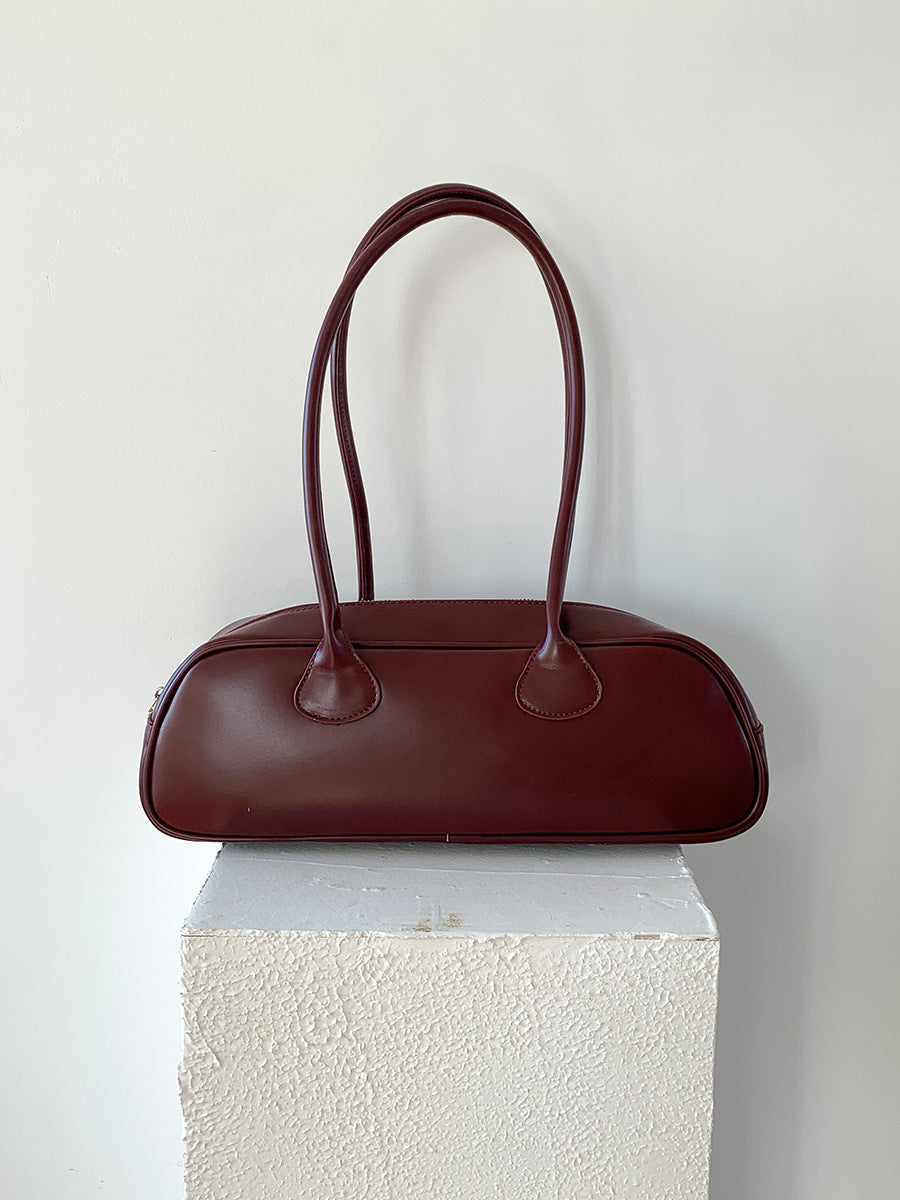 Aurore Oval Baguette Bag