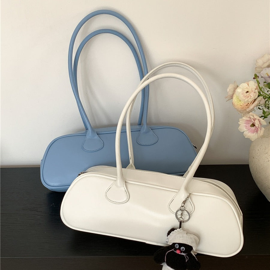 Aurore Oval Baguette Bag